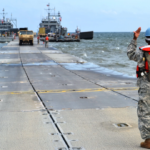 Problem: The lifting Shackles in Front of This Soldier are a Tripping Hazard and are Gather Water, Causing Rust